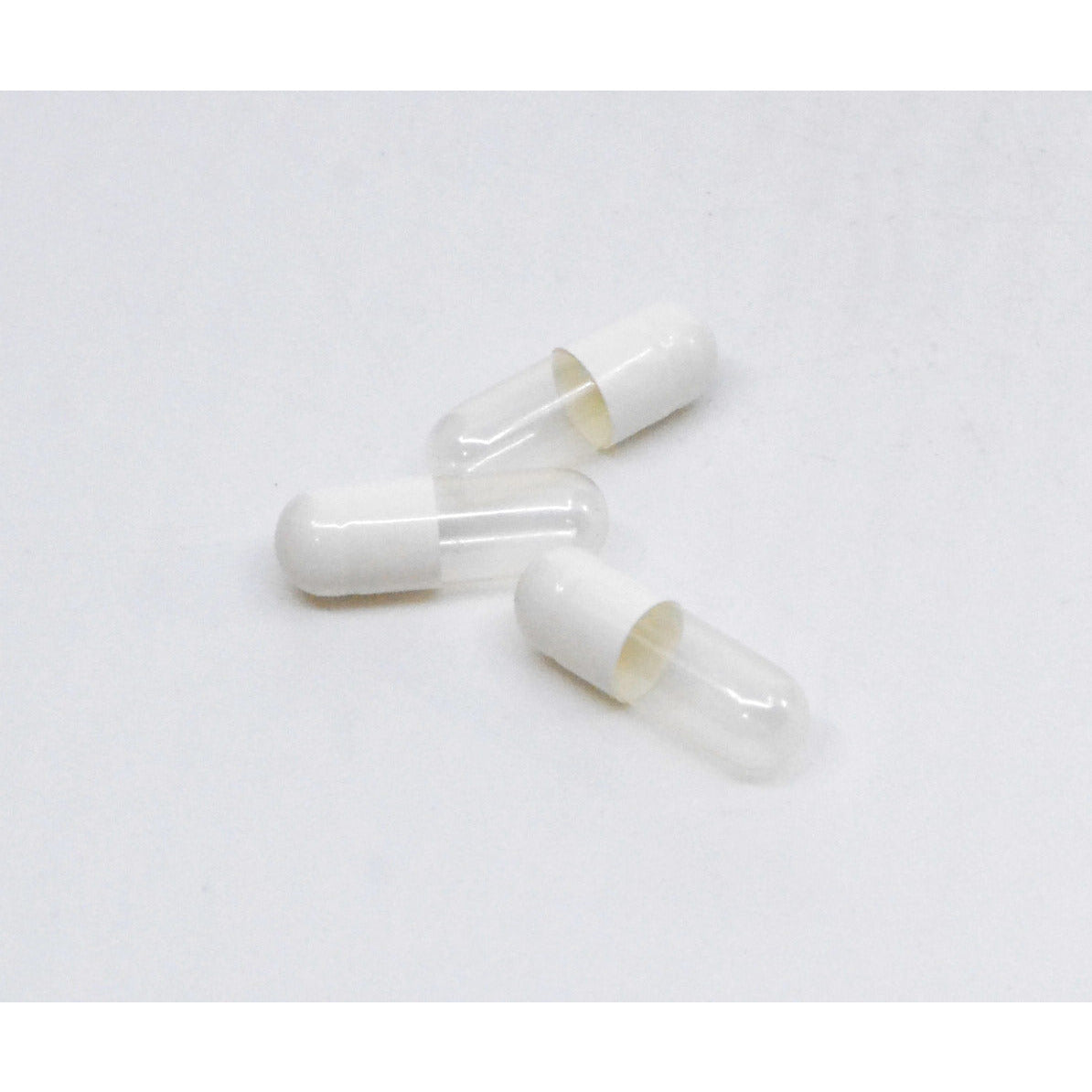 Size #1-White Opaque/Clear - Gelatin Capsules Close Up Individual Caps